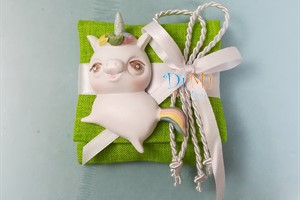 Cuscinetto verde con unicorno