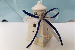 Faro con conchiglia e nastri blu e bianco