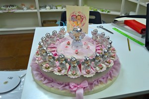 Torta con angeli in madreperla e argentati